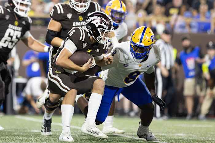 Sep 17, 2022; Kalamazoo, Michigan, USA Western Michigan Broncos quarterback Jack Salopek (6) runs the ball against Pittsburgh Panthers defensive tackle Calijah Kancey (8) at Waldo Stadium. Mandatory Credit: Kimberly Moss-USA TODAY Sports